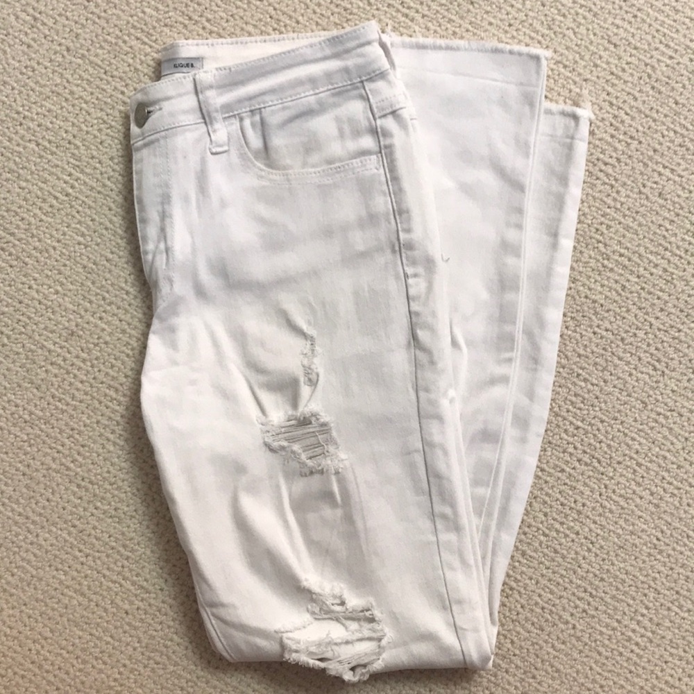 KLIQUE B. Distressed ripped white skinny jeans